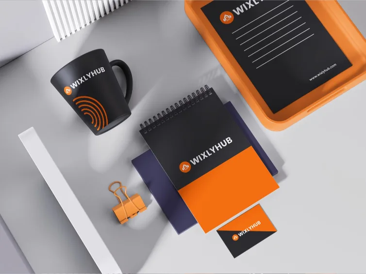 WixlyHub brand identity on stationery and merchandise